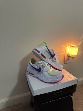 Nike Air Max White Sneakers with Blue Swoosh and Pink/Neon Accents